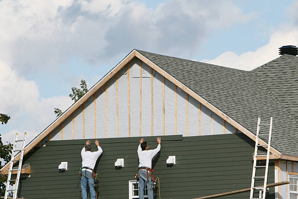 Professional Siding Installation technician working in Boston, IN